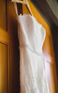 Enzoani 'Olva' size 8 used wedding dress side view on hanger