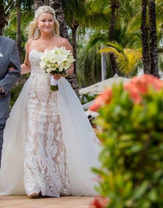 Badgley Mischka 'Amal' size 10 used wedding dress front view on bride
