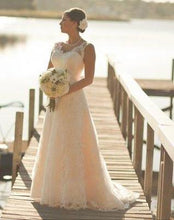 Load image into Gallery viewer, Casablanca &#39;A Line Lace&#39; size 6 used wedding dress front view on bride

