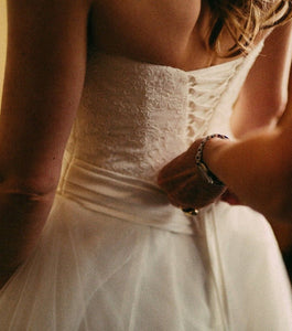 Eddy K '1061' size 4 used wedding dress back view on bride