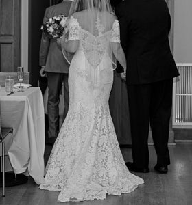 Romona Keveza '6104' size 6 used wedding dress back view on bride