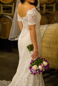 Romona Keveza '6104' size 6 used wedding dress side view on bride
