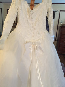 Emmanuelle 'Ball Gown' size 12 used wedding dress back view on hanger