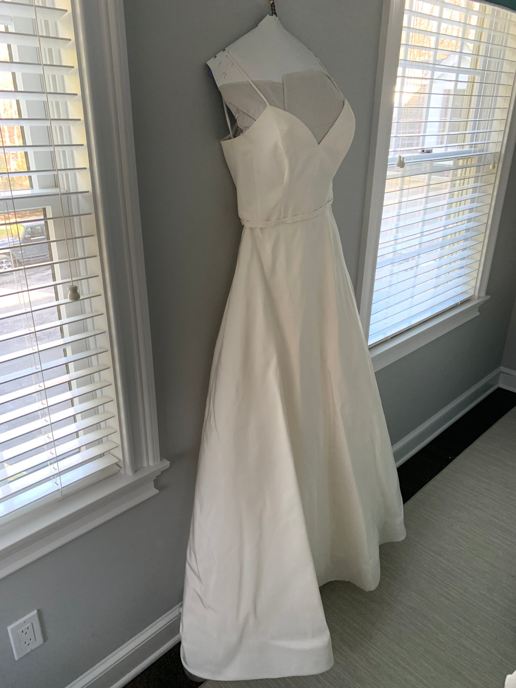 Amsale 'Rowan Silk Faille' size 10 used wedding dress side view on hanger