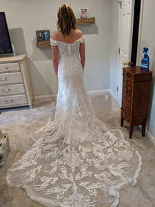 Oleg Cassini 'CWG807' size 6 new wedding dress back view on bride