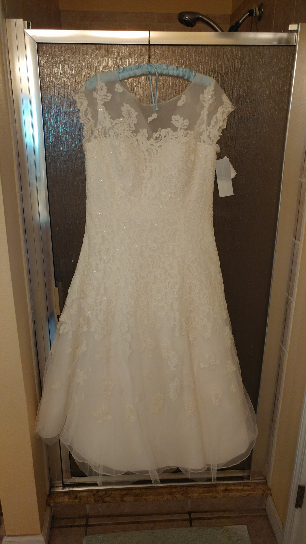 Oleg Cassini 'CMK513' size 12 new wedding dress front view on hanger
