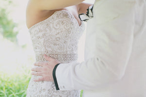 Ysa Makino '253579' size 8 used wedding dress side view on bride