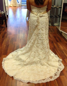 Maggie Sottero 'Karena Royale' size 18 new wedding dress back view on bride