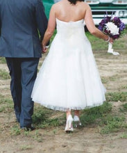 Load image into Gallery viewer, Oleg Cassini &#39;Tea Length&#39; size 6 used wedding dress back view on bride
