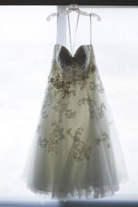 Oleg Cassini 'Tea Length' size 6 used wedding dress front view on hanger