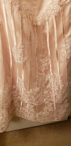 Custom 'Column Lace' size 16 new wedding dress view of fabric