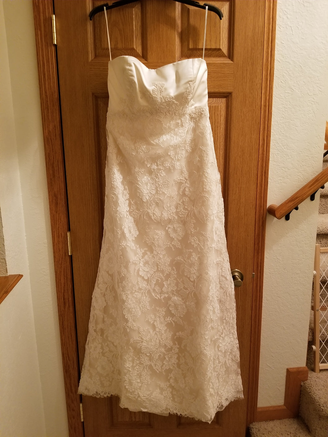 Christos 'Elegant Sheath' size 8 used wedding dress front view on hanger