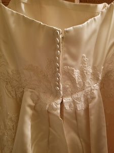 Christos 'Elegant Sheath' size 8 used wedding dress back view on hanger