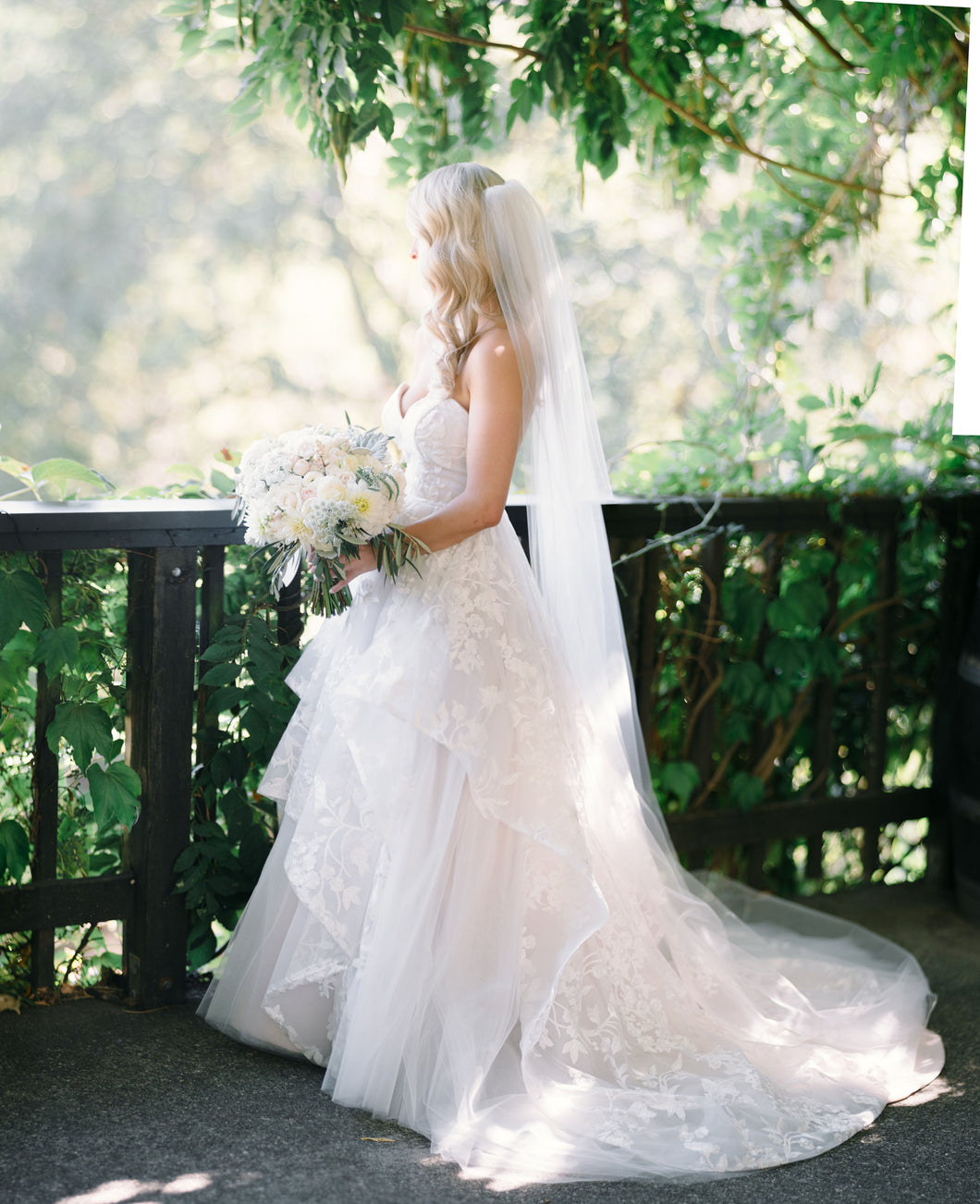 Hayley Paige 'Lulu' size 10 used wedding dress side view on bride
