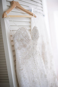 Casablanca 'B087' size 0 used wedding dress side view on hanger