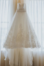 Load image into Gallery viewer, Eddy K &#39;1061&#39; size 4 used wedding dress front view on hanger
