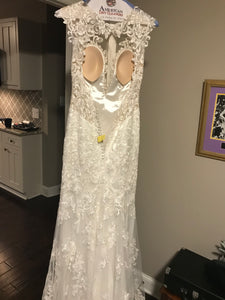 Eddy K '1131' size 4 used wedding dress back view on hanger