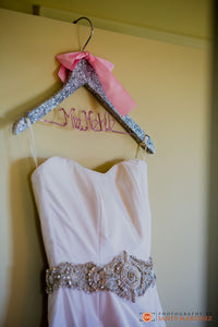 Gabriella Arango 'Off White' size 4 used wedding dress front view close up on hanger