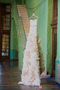 Gabriella Arango 'Off White' size 4 used wedding dress front view on hanger
