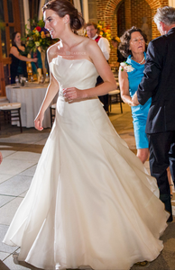 Rivini 'Nicoletta' size 4 used wedding dress front view on bride