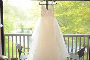 David's Bridal 'Garza Ball Gown' size 10 used wedding dress front view on hanger