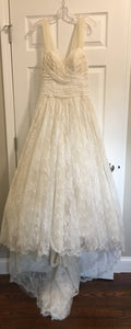 Maggie Sottero 'Marta' size 12 used wedding dress front view on hanger