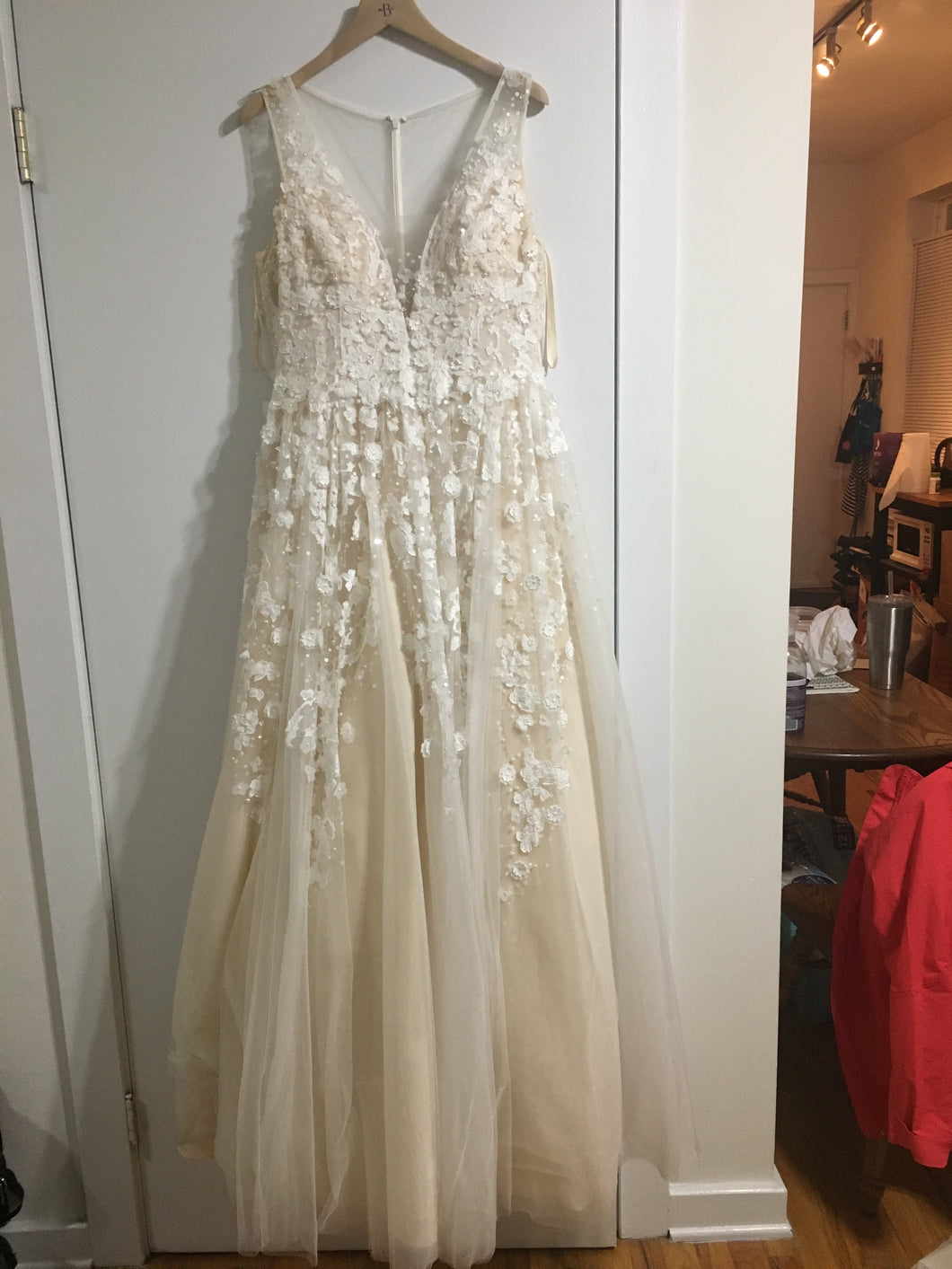 BHLDN 'Ariane' size 12 used wedding dress front view on hanger