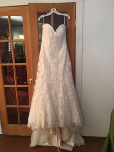 Maggie Sottero 'Rosamund' size 14 used wedding dress front view on hanger