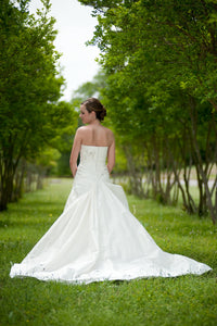 Blue 'Brigham' size 0 used wedding dress back view on bride