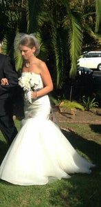 Vera Wang 'Fit and Flare' size 4 used wedding dress side view on bride