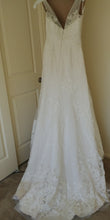 Load image into Gallery viewer, Oleg Cassini &#39;517&#39; size 2 used wedding dress back view on hanger
