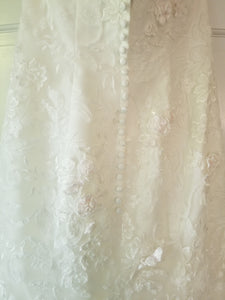 Oleg Cassini '464' size 6 used wedding dress back view on hanger