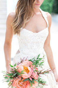 Yolan Cris 'Custom' size 0 used wedding dress front view on bride