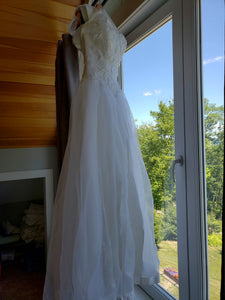 Custom 'Georgette of Boston' size 6 used wedding dress back view on hanger
