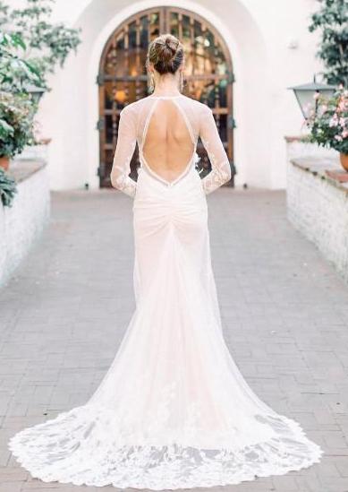 Inbal Dror 'Custom' size 4 used wedding dress back view on bride