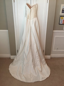 Casablanca '1881' size 6 used wedding dress back view on hanger