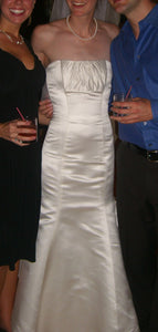 Custom 'Strapless' size 2 used wedding dress front view on bride