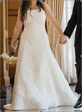 Load image into Gallery viewer, Vera Wang &#39;Ivory Lace Strapless A-Line&#39; size 4 used wedding dress front view on bride
