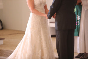 Eddy K. 'Adrianna' size 6 used wedding dress front view on bride