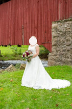 Load image into Gallery viewer, Maggie Sottero &#39;Kaitlyn&#39; size 14 used wedding dress front view on bride
