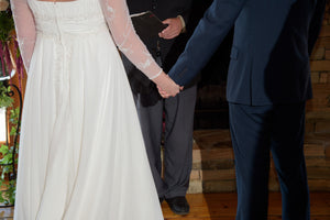 David's Bridal 'Soft Chiffon' size 14 used wedding dress back view on bride