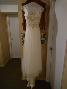 Maggie Sottero 'Caitlyn' size 12 used wedding dress front view on hanger