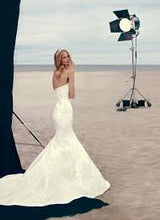 Load image into Gallery viewer, Oleg Cassini &#39;CWG594&#39; size 4 used wedding dress back view on bride
