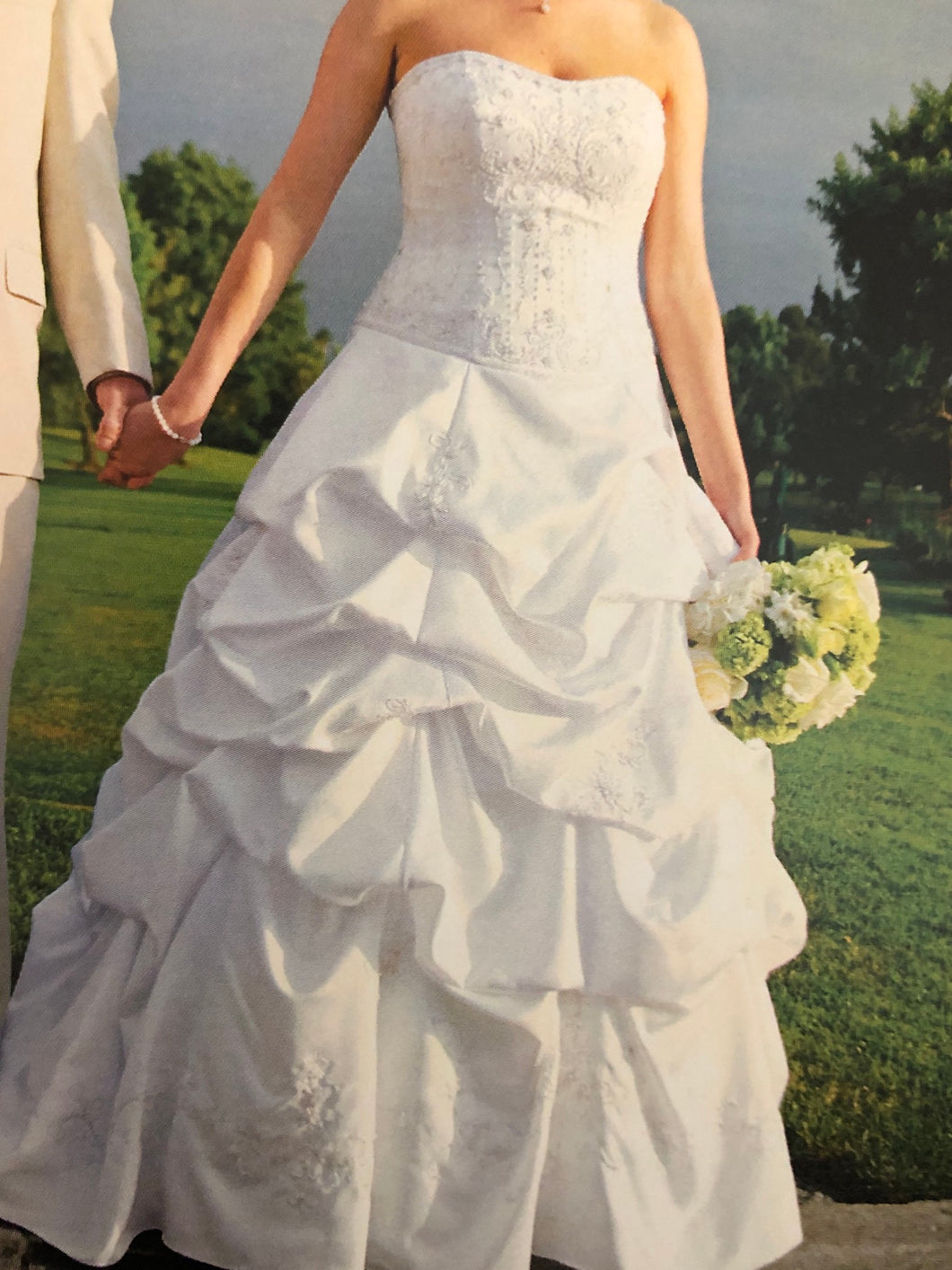 Oleg Cassini '7CT291' size 6 used wedding dress front view on bride
