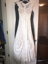 Load image into Gallery viewer, Essense of Australia &#39;Stella York&#39; size 2 used wedding dress back view on hanger
