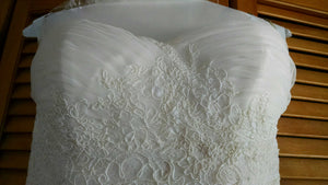 Paloma Blanca 'Strapless Ivory' size 4 used wedding dress front view close up
