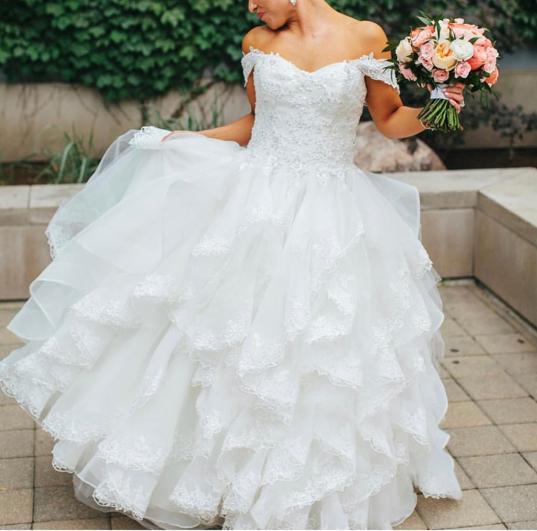 Madeline Gardner 'MCMG5110' size 6 used wedding dress front view on bride