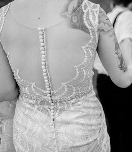 Madison James '303' size 6 used wedding dress back view on bride