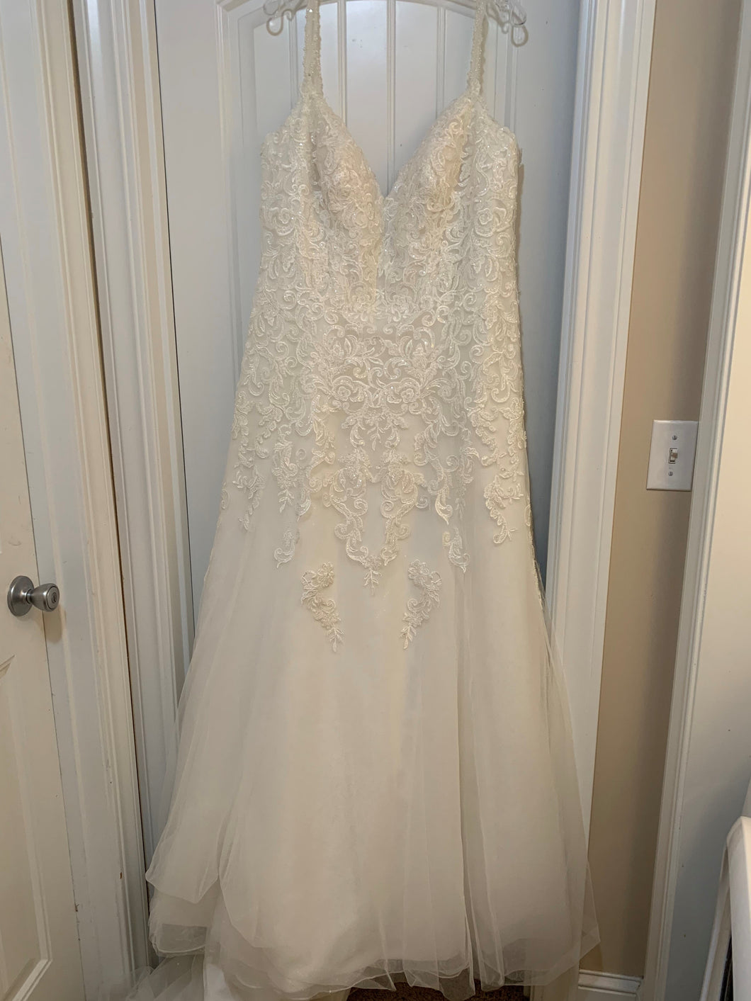 Stella York '6612' size 14 sample wedding dress front view on hanger