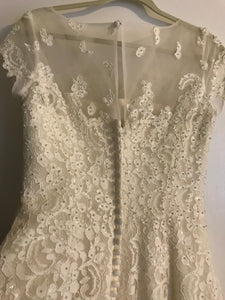 Oleg Cassini 'Illusion' size 6 used wedding dress back view of dress